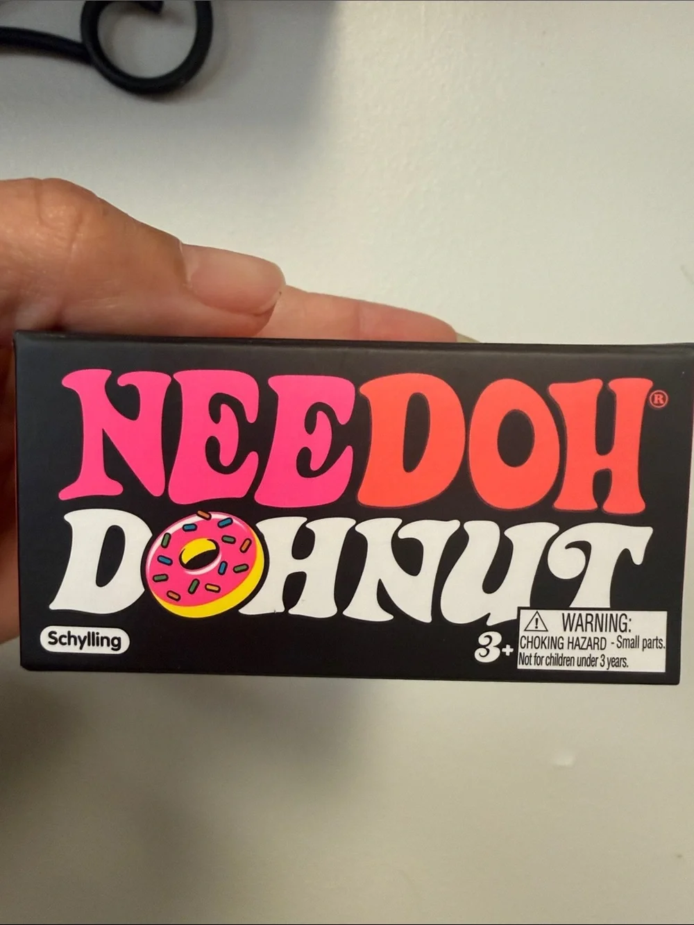 Needoh Donut Switch & Swap Frosting Pink Donut Toy with Yellow Accents